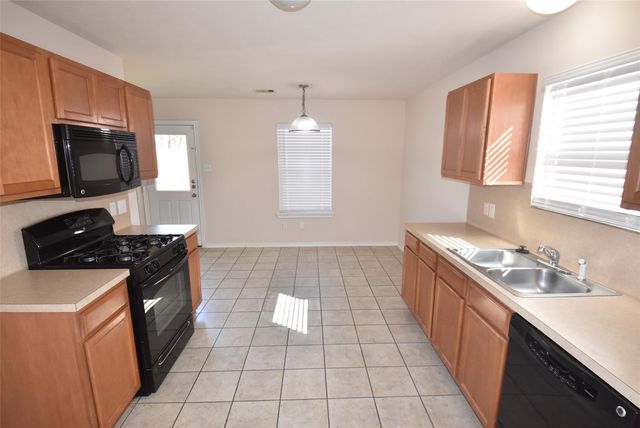 1615 Redbud Grove Court, Conroe, TX 77301