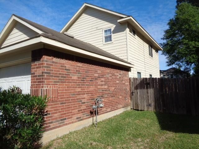 1615 Redbud Grove Court, Conroe, TX 77301