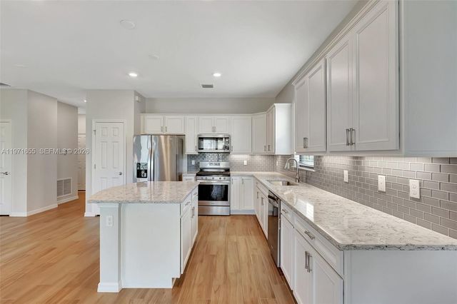 727 SE Boboli Way, Port St. Lucie, FL 34984