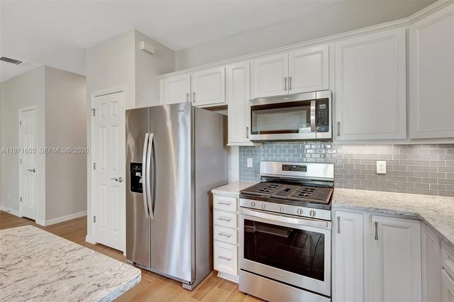 727 SE Boboli Way, Port St. Lucie, FL 34984