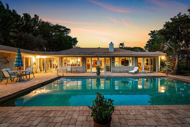 416 S Country Club Drive, Atlantis, FL 33462