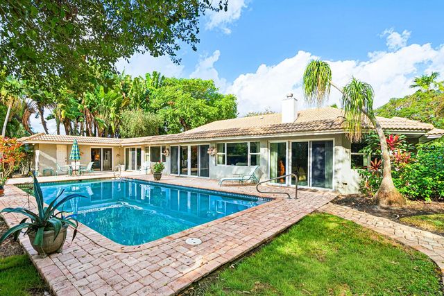 416 S Country Club Drive, Atlantis, FL 33462