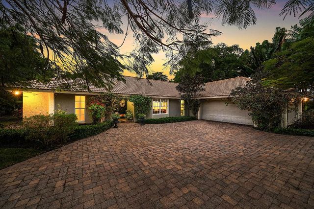 416 S Country Club Drive, Atlantis, FL 33462