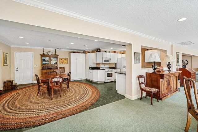 416 S Country Club Drive, Atlantis, FL 33462