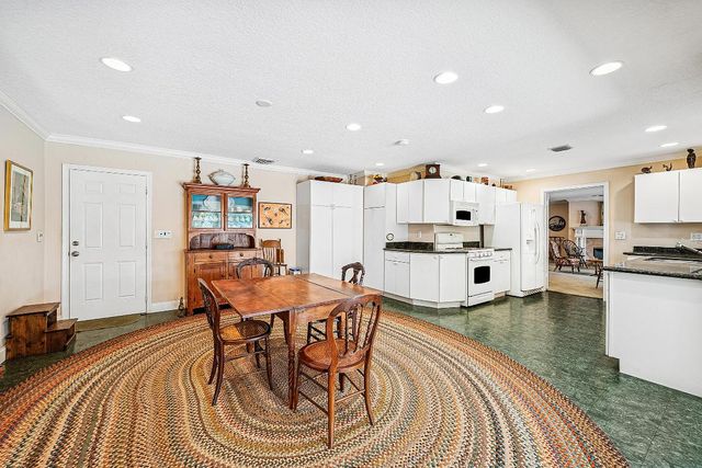 416 S Country Club Drive, Atlantis, FL 33462