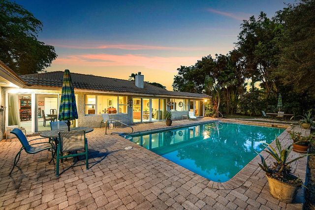 416 S Country Club Drive, Atlantis, FL 33462