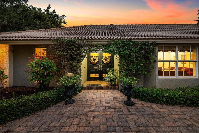 416 S Country Club Drive, Atlantis, FL 33462