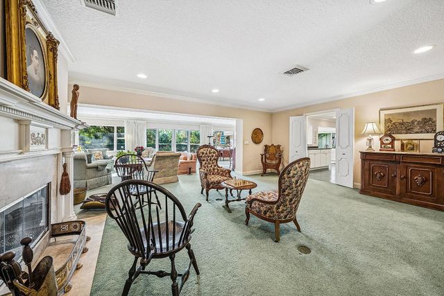 416 S Country Club Drive, Atlantis, FL 33462