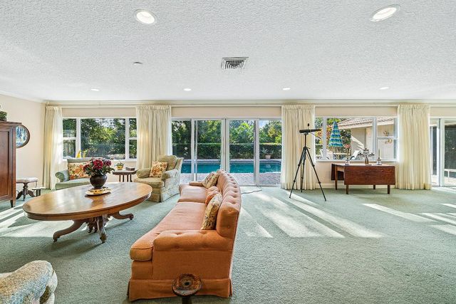 416 S Country Club Drive, Atlantis, FL 33462