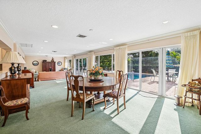 416 S Country Club Drive, Atlantis, FL 33462