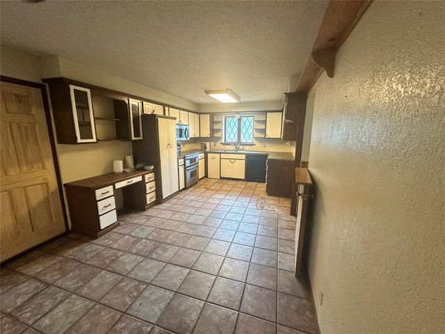 6909 Lago Ranchero Drive, Norman, OK 73026