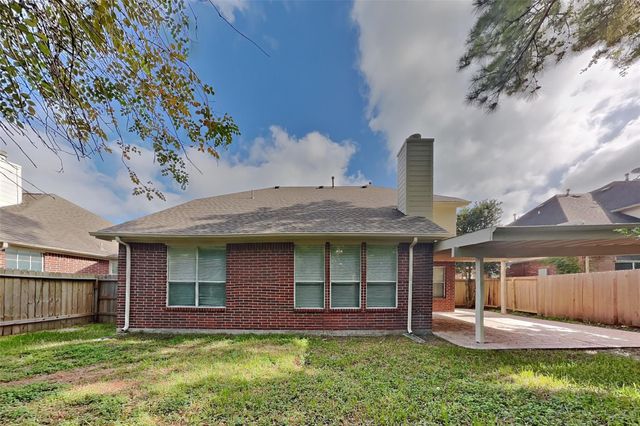 1418 Summer Rain Drive, Kingwood, TX 77339