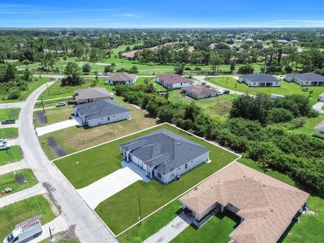 734 JACK AVENUE S, Lehigh Acres, FL 33973