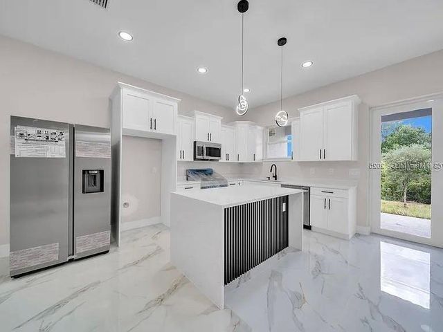 734 JACK AVENUE S, Lehigh Acres, FL 33973