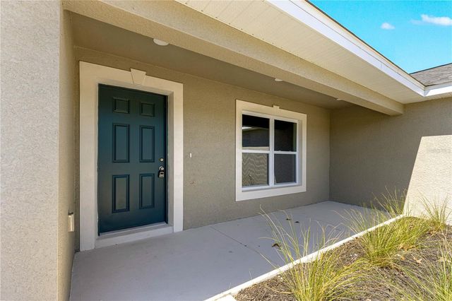 22 MALAUKA RUN LANE, Ocklawaha, FL 32179