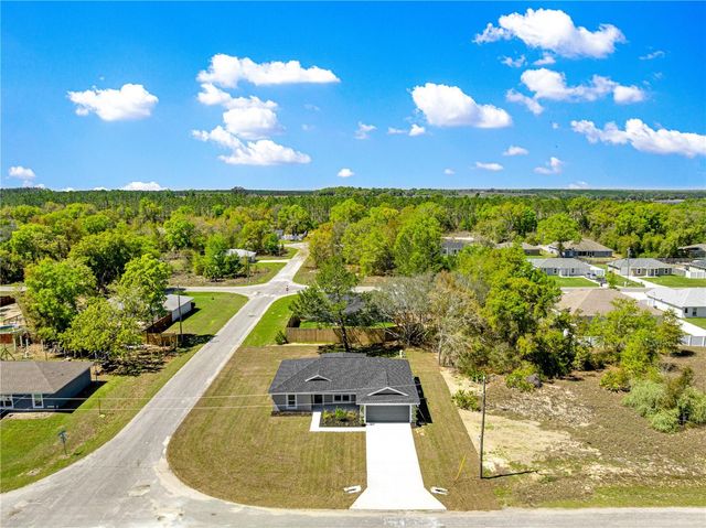 22 MALAUKA RUN LANE, Ocklawaha, FL 32179