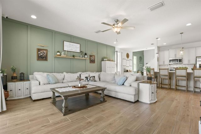 7104 DILLY LAKE AVENUE, Groveland, FL 34736