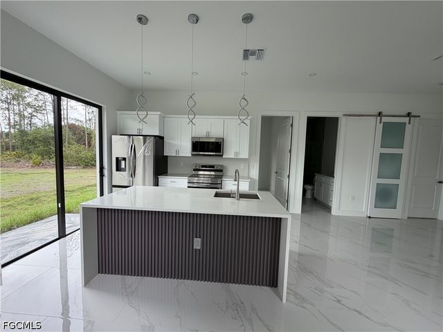 1607 E 14th ST, Lehigh Acres, FL 33972