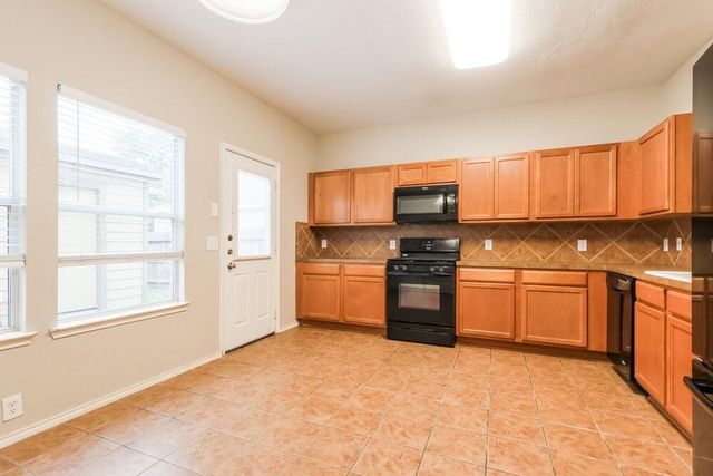 23611 Twisting Falls Drive, Spring, TX 77373