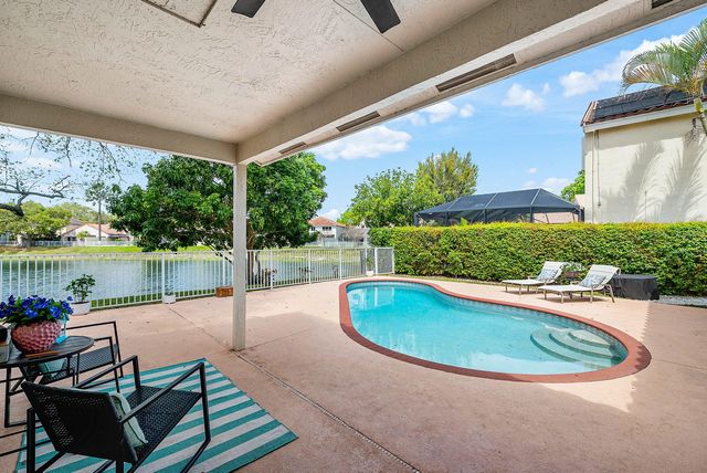 7505 NW 65th Lane, Parkland, FL 33067