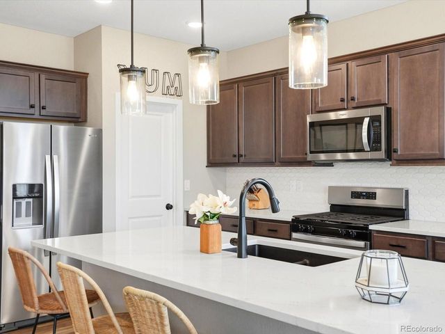305 Baler Ct, Brighton, CO 80601