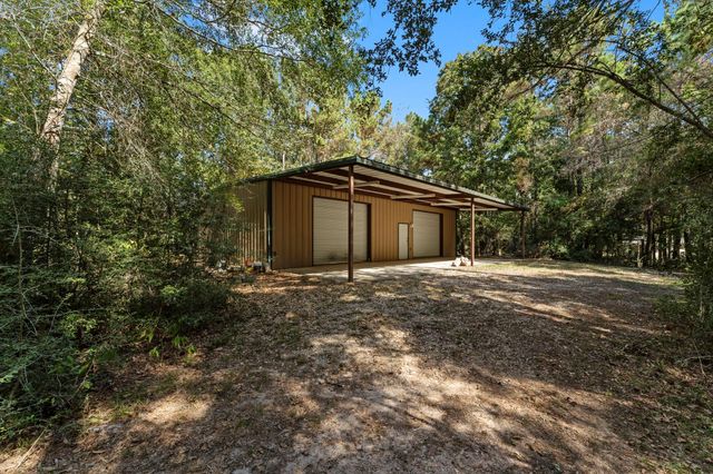 102 Forest Wind Court, Montgomery, TX 77316