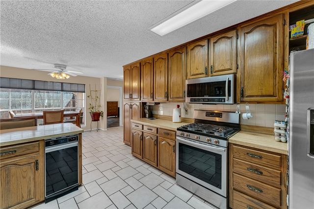 106 E Woodlou Lane, Rogers, AR 72756