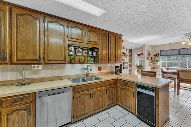 106 E Woodlou Lane, Rogers, AR 72756