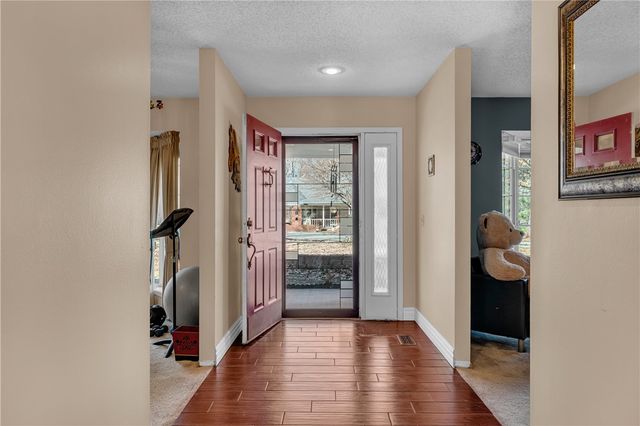 106 E Woodlou Lane, Rogers, AR 72756