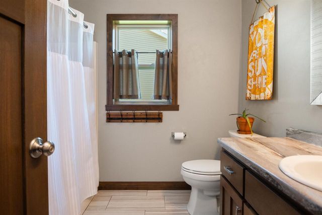 1342 BUCKYS, Howard, WI 54313