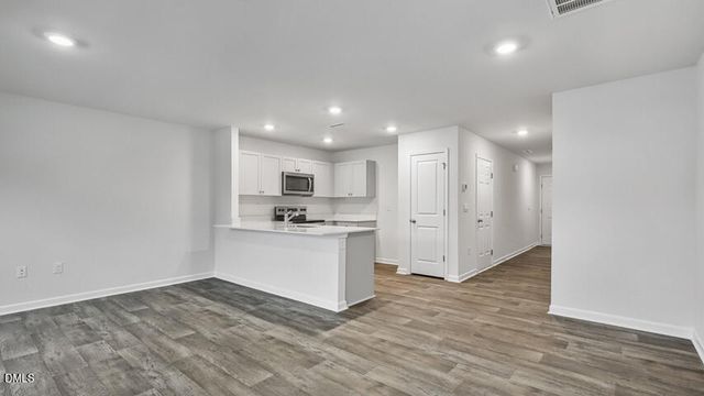 609 Ferio Court, Gibsonville, NC 27249