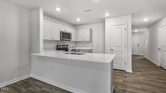 609 Ferio Court, Gibsonville, NC 27249