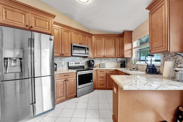 7324 NW 1st Place, Plantation, FL 33317