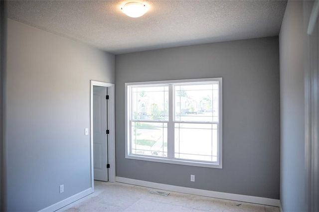 830 Cedar Ridge Drive, Raymore, MO 64083