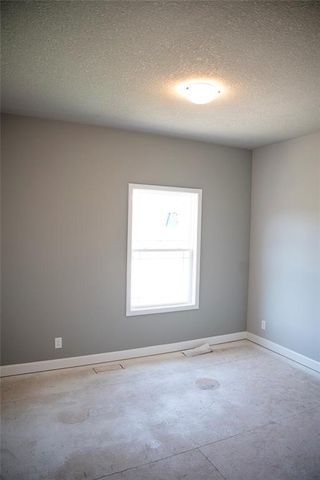 830 Cedar Ridge Drive, Raymore, MO 64083