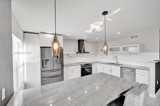 1075 92nd St 405, Bay Harbor Islands, FL 33154