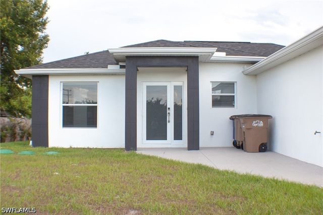 3103 11th ST SW, Lehigh Acres, FL 33976