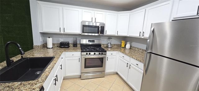 1310 SEVEN EAGLES COURT 202, Reunion, FL 34747