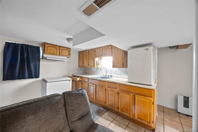 24 Jackson Avenue, Elmont, NY 11003