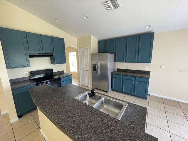 1406 VISTA DEL LAGO BOULEVARD, Dundee, FL 33838