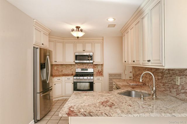 104 Lakebridge Drive N, Kings Park, NY 11754