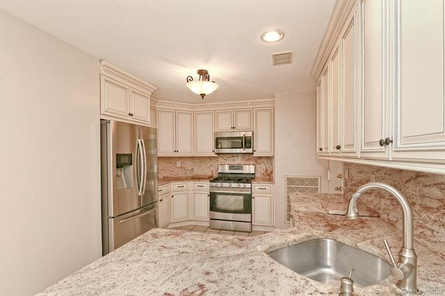 104 Lakebridge Drive N, Kings Park, NY 11754