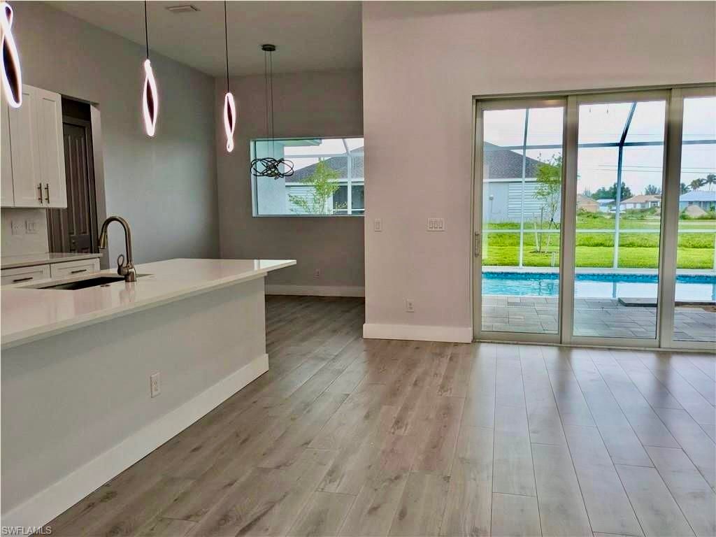 Image 5 of property listing at 3027 SW 16th PL, Cape Coral, FL 33914