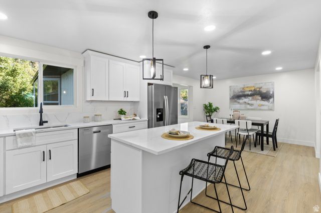 8657 S 910 E, Sandy, UT 84094