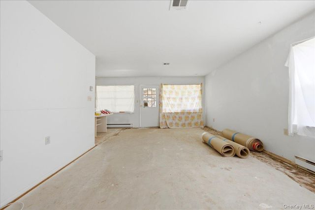 158 Falmouth Court A, Ridge, NY 11961