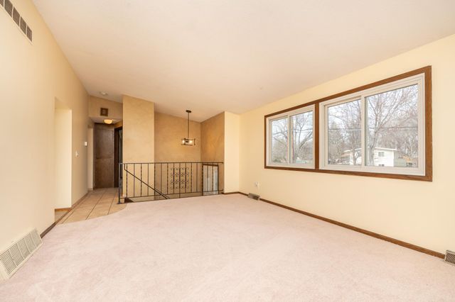 6401 Shingle Creek Drive, Brooklyn Park, MN 55445