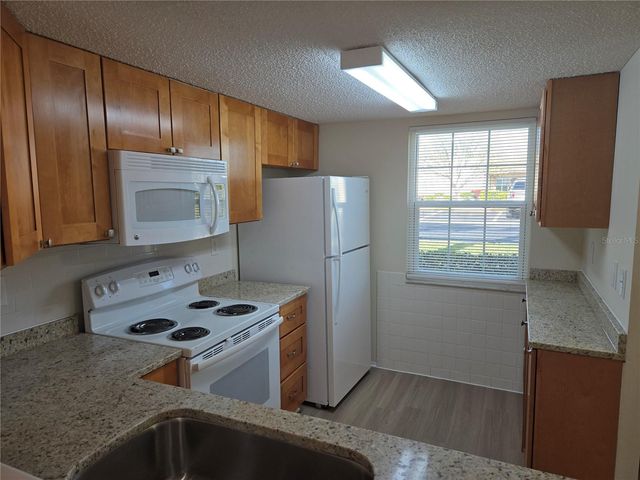 11130 CARRIAGE HILL DRIVE 4, Port Richey, FL 34668