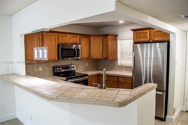 3090 Holiday Springs Boulevard 305, Margate, FL 33063
