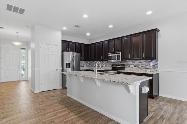 32659 HARMONY OAKS DRIVE, Wesley Chapel, FL 33545
