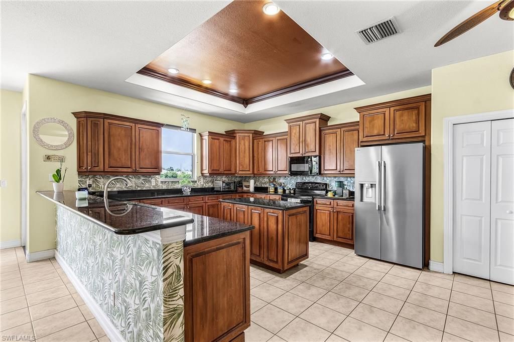 Image 5 of property listing at 2441 NW 9th TER, Cape Coral, FL 33993